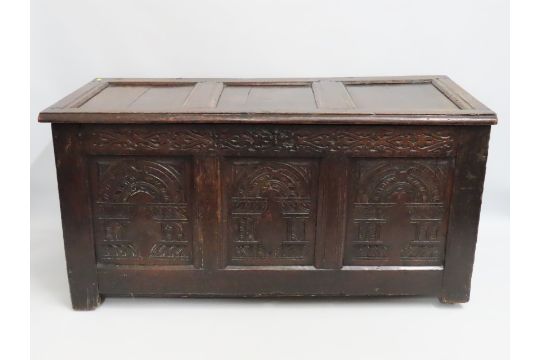 A 17thC. oak coffer, 1250mm wide x 560mm deep x 63