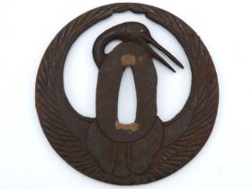 An antique Japanese Samurai Tsuba depicting a cran