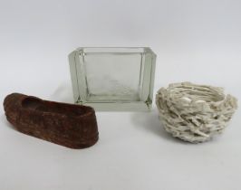 A Chinese porcelain nest with eggs twinned with a Chinese carved stone shoe, 100mm long & a crystal