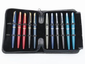 A case of eleven Parker fountain pens including a