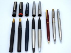 Five fountain pens, two Osmiroid including left ha