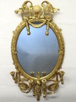 A c.1800 ornate gilt girandole mirror with origina