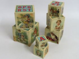 A set of child's Victorian nesting pictorial & alphabet stacking blocks, some faults