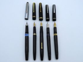 Four shorthand pens - two Conway fountain pens wit