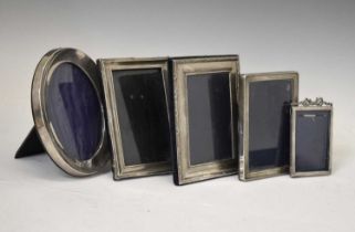 Collection of five silver photo frames