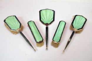 George V silver and green enamel five-piece dressing table set, etc