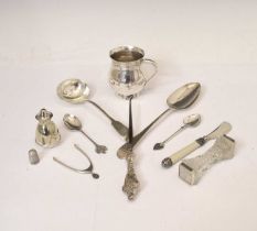 Quantity of silver items to include Christening mug, wishbone tongs, tablespoon, etc