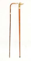 Reproduction duck 'toper' walking stick and an early 20th century cane