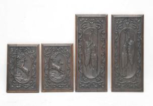 Two pairs of carved oak panels