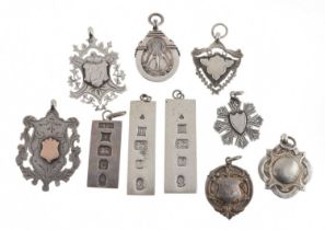 Three silver 'Silver Jubilee' ingots, Birmingham 1977, and seven silver fobs