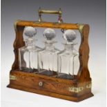 Early 20th century oak three-bottle tantalus