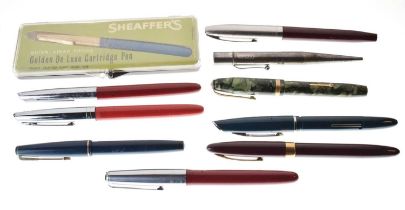 George V silver propelling pencil, and a group of vintage fountain pens