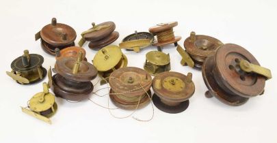 Quantity of vintage fishing reels and small wickers basket