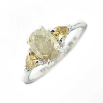 Fancy colour diamond three-stone ring