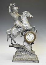 Large metal figural mantel clock of a knight on horseback