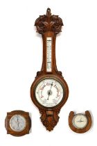 Early 20th century oak wheel barometer and two smaller examples