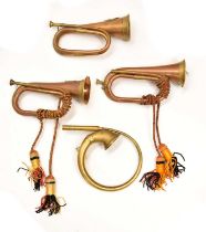 Three copper and brass military bugles