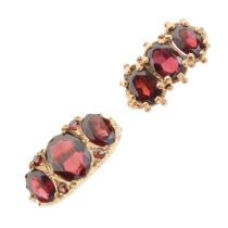 Two 9ct gold garnet dress rings