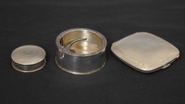 George V silver pill box, a silver compact, and a white-metal circular stand