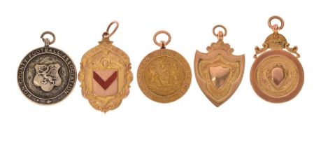 Four 1920s 9ct gold football medals