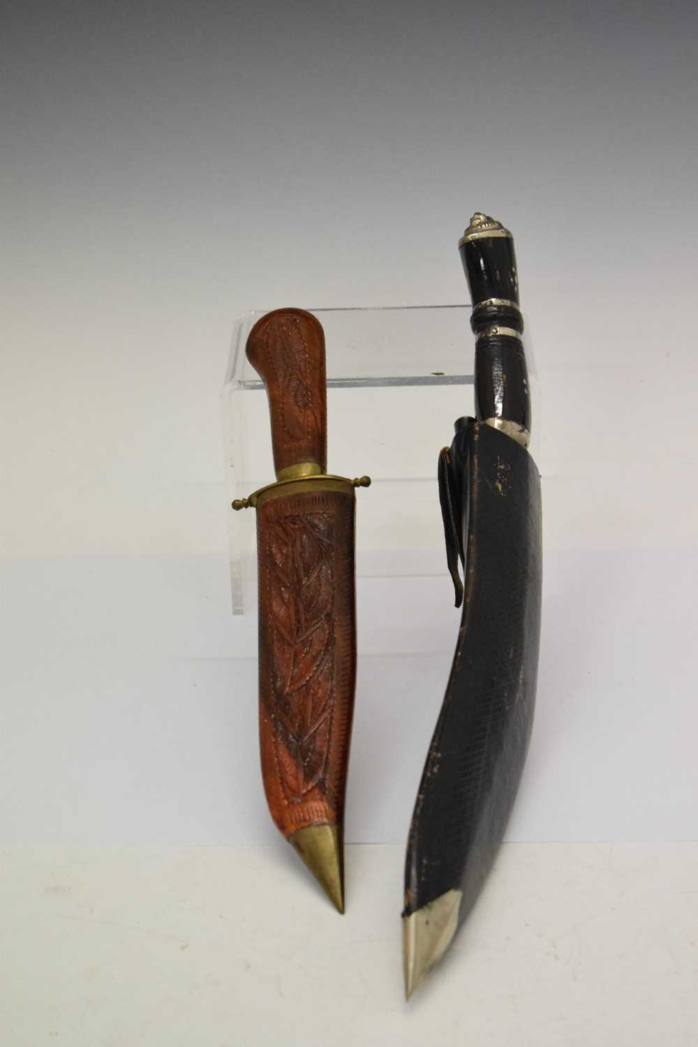 Indian Kukri knife and a modern dagger