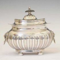 Edward VII silver tea caddy with gadroon decoration and a pair of lion head handles