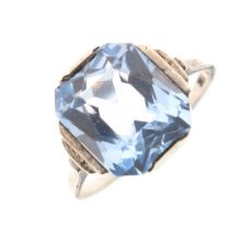 Aquamarine-coloured single stone ring