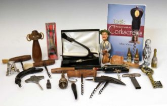 Collection of vintage corkscrews and other items