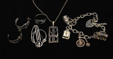Four pieces of Rennie Macintosh-style silver jewellery