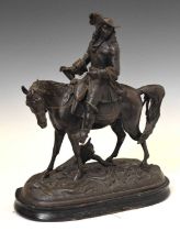 Spelter figure of a cavalier on horse back