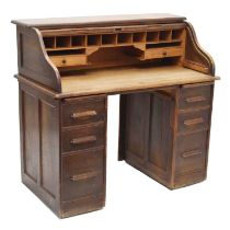 Early 20th century oak tambour-top twin pedestal desk