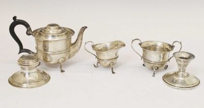 Silver three-piece tea set, a George V capstan inkwell, and an American dwarf candlestick