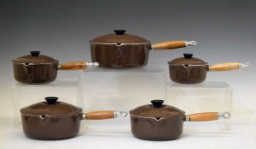 Le Creuset - Graduated set of five brown enamel saucepans