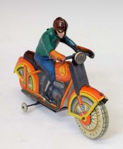 Soviet-era Metta clockwork tin-plate motorcycle with rider