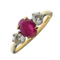 18ct gold, ruby and diamond three-stone ring