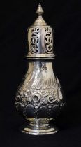 Victorian silver baluster sugar caster with embossed Rococo decoration