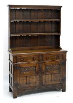 20th century carved oak high dresser