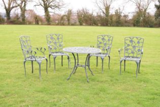 Five piece green-painted aluminium patio set