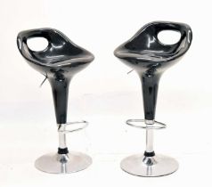 Pair of black retro style chrome based bar stools