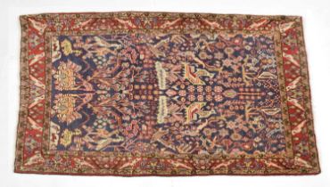 Blue and red ground wool rug