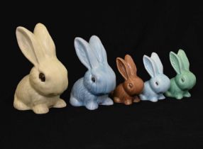 Group of Sylvac and other pottery graduated rabbits