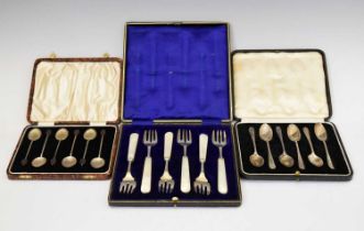 Two sets of silver teaspoons, and a cased set of mother-of-pearl handled forks