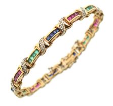 Diamond, ruby, sapphire and emerald yellow metal bracelet