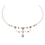Early 20th century amethyst and seed pearl swag necklace
