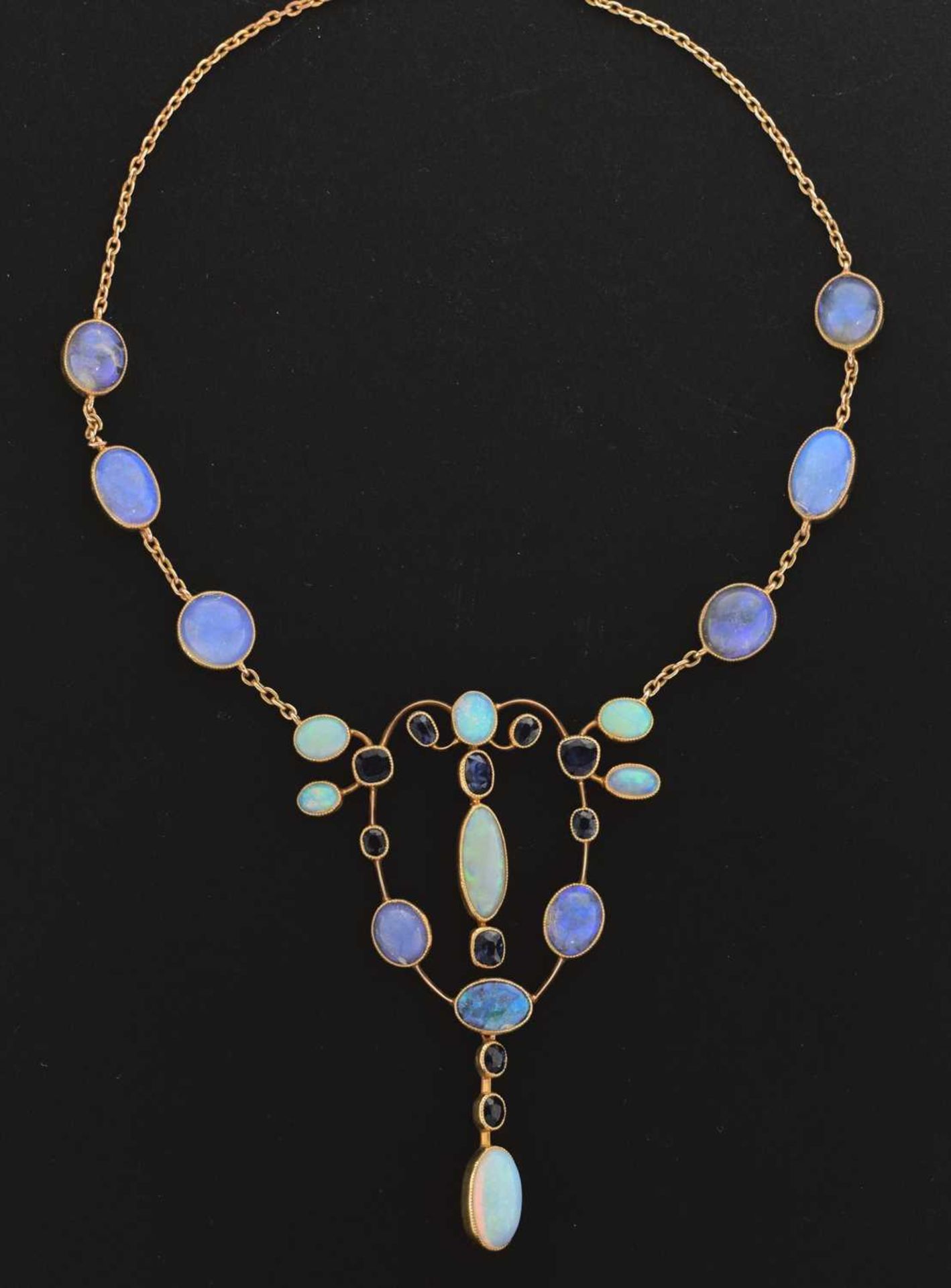 Opal and sapphire pendant necklace in the Arts and Crafts manner