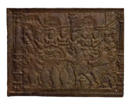 Antique Continental cast iron fire back depicting The Wedding at Cana