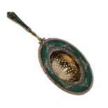 Norwegian white metal tea strainer with classical green enamel decoration