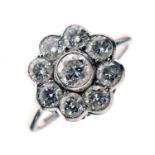 Diamond nine stone daisy cluster ring