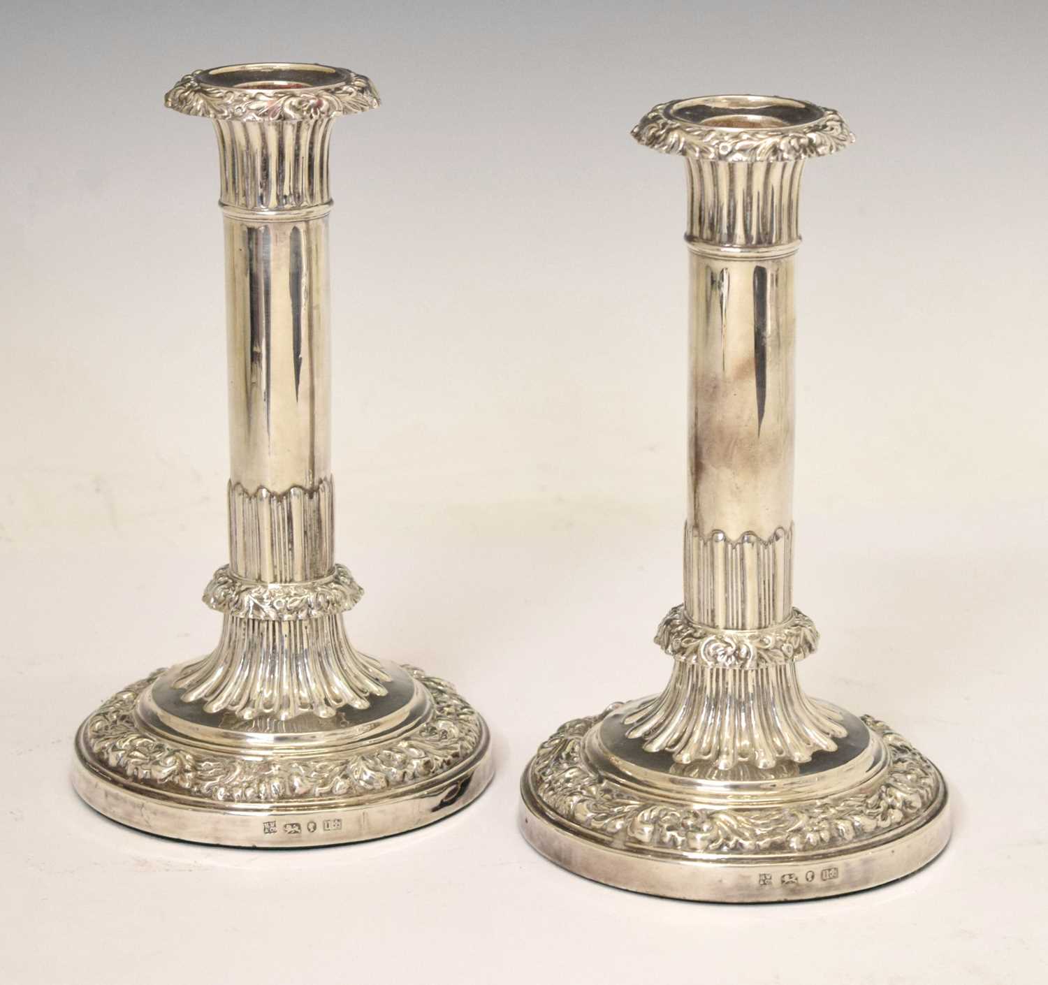 Pair of Victorian silver candlesticks