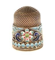 Russian white metal thimble with an enamel band of floral decoration